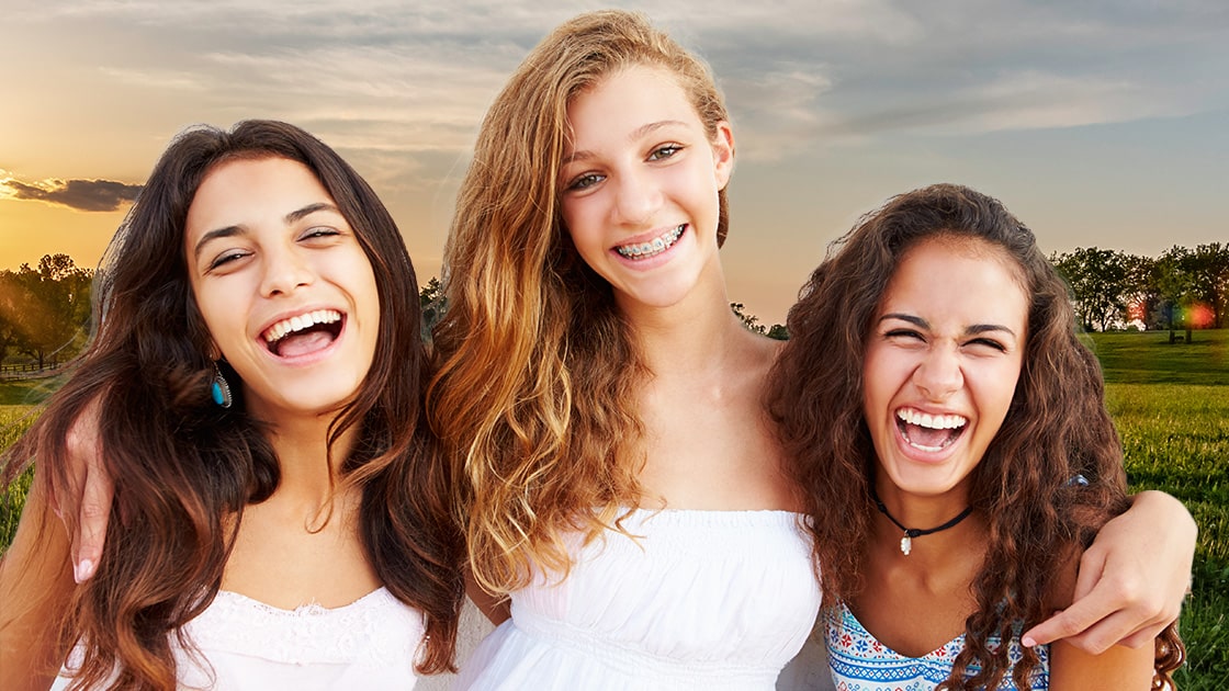 Smiling Teens | Why Ortho